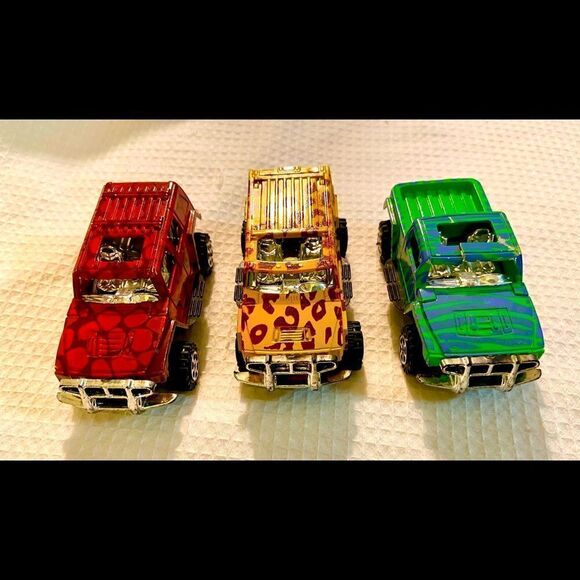 Vintage Lot Of 3 Toy 4 X 4 Trucks W Animal Prints Good Condition Unbranded. - Picture 1 of 12
